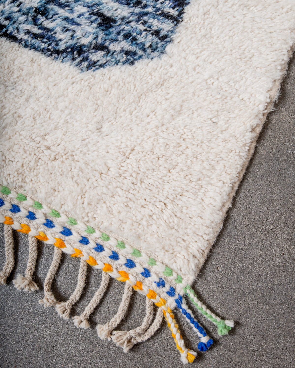 Modern, designer, handcrafted Berber rug from Morocco. Beniourain carpet with beautiful colours and patterns and fluffy wool texture.